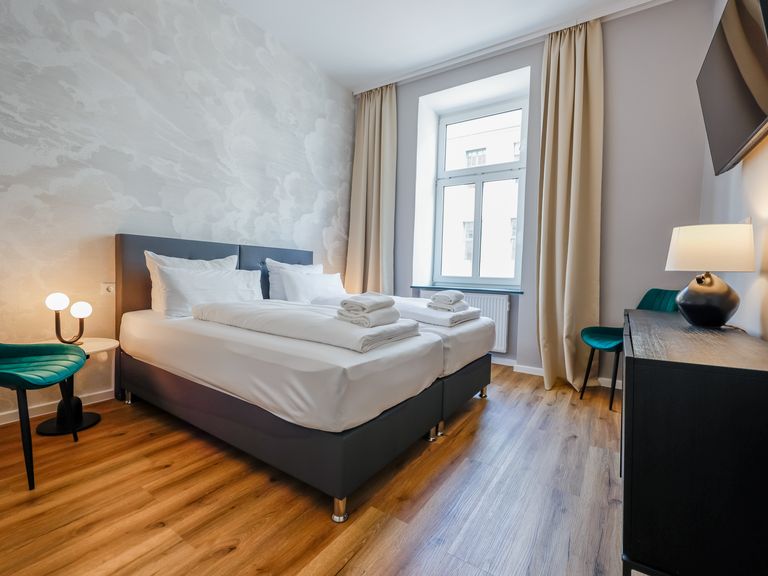 flatista homes apartments in München, Wohnung "Auguste", Schlafzimmer