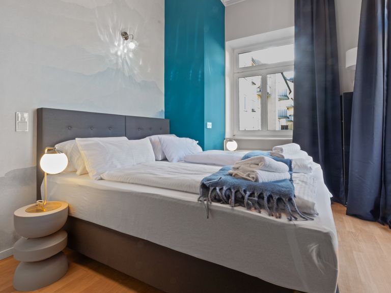 flatista homes apartments in München, Wohnung "Gisela", Schlafzimmer