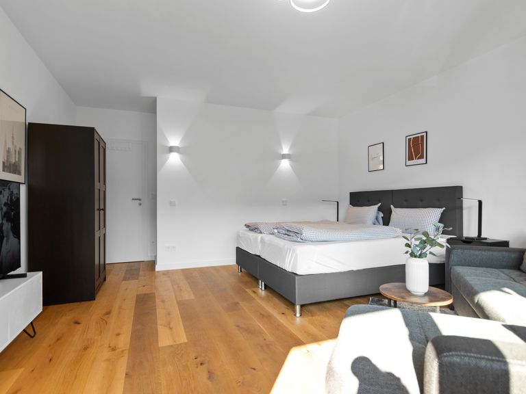 flatista homes apartments in München, Wohnung "Hirschgarten", Schlafzimmer