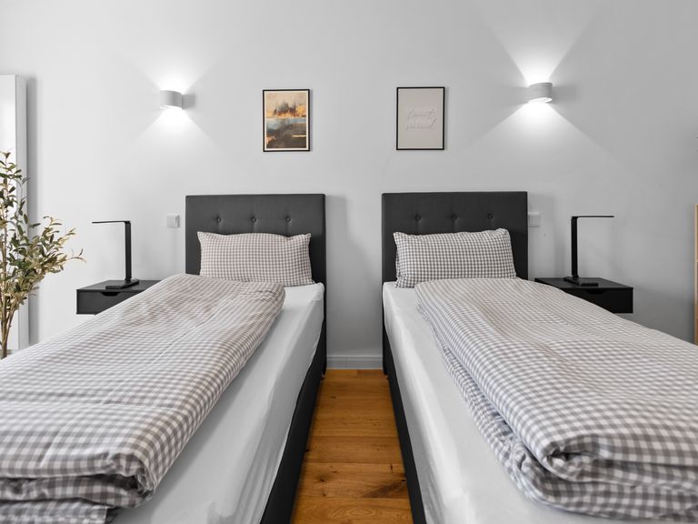 flatista homes apartments in München, Wohnung "Hirschgarten", Schlafzimmer