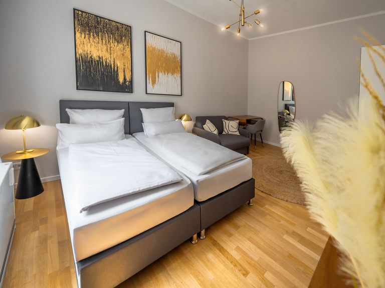flatista homes apartments in München, Wohnung "Isabella", Schlafzimmer
