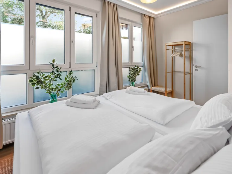 flatista homes apartments in München, Wohnung "Leon", Schlafzimmer