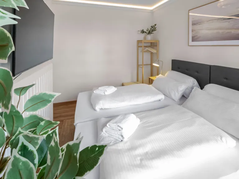 flatista homes apartments in München, Wohnung "Leon", Schlafzimmer