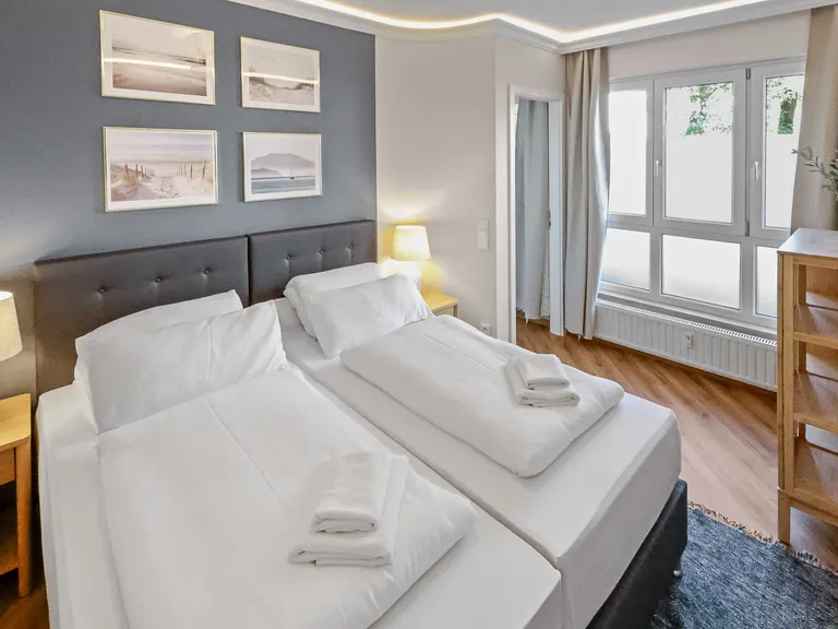 flatista homes apartments in München, Wohnung "Leon", Schlafzimmer
