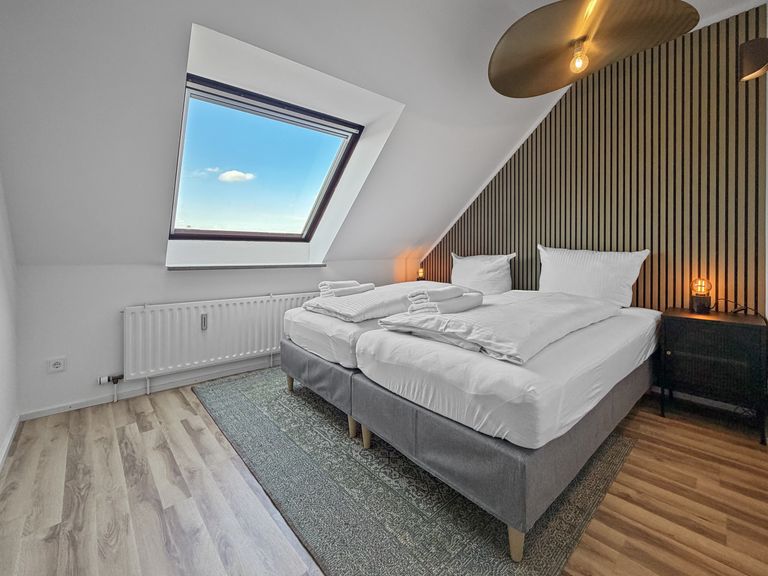 flatista homes apartments in München, Wohnung "Leopold", Schlafzimmer