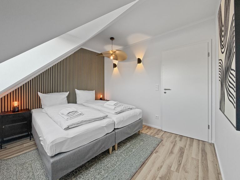 flatista homes apartments in München, Wohnung "Leopold", Schlafzimmer