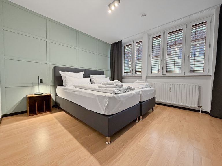 flatista homes apartments in München, Wohnung "Rudolf", Schlafzimmer