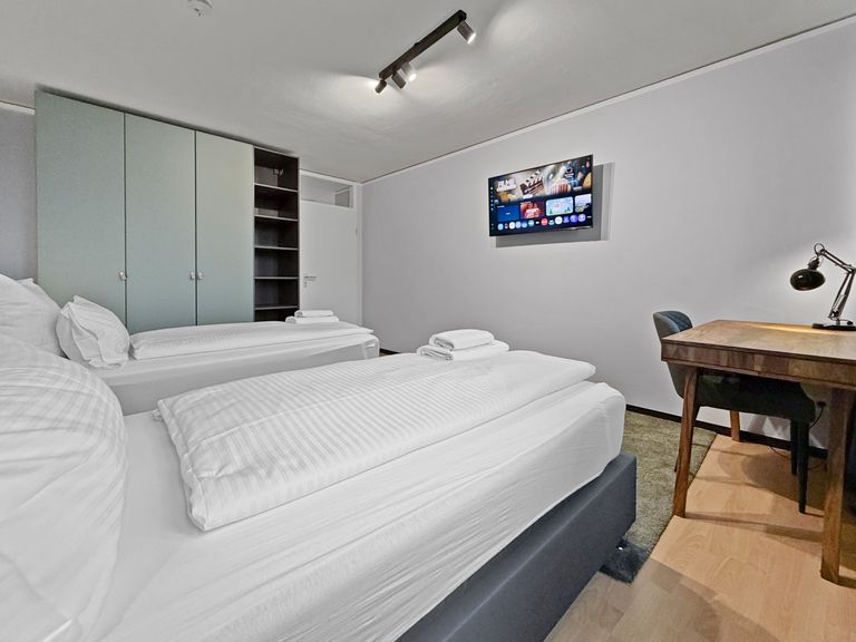 flatista homes apartments in München, Wohnung "Rudolf", Schlafzimmer