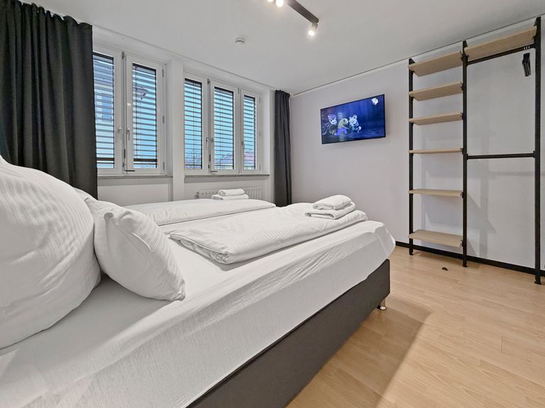 flatista homes apartments in München, Wohnung "Rudolf", Schlafzimmer