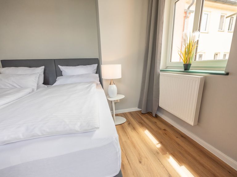 flatista homes apartments in München, Wohnung "Sophie", Schlafzimmer