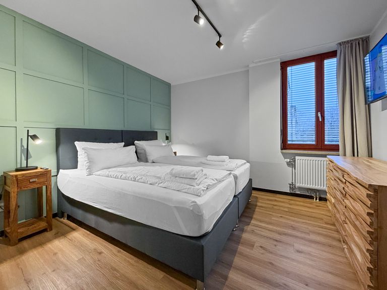 flatista homes apartments in München, Wohnung "Wilhelm", Schlafzimmer